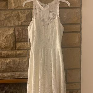 Macy’s high low white dress. Perfect for a rehearsal dinner or bridal shower